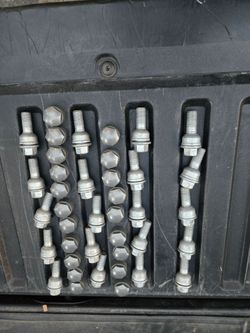 Used 20 piece set of Audi lug nuts and caps