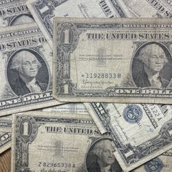 Thirteen 1957 Silver Certificate $1 