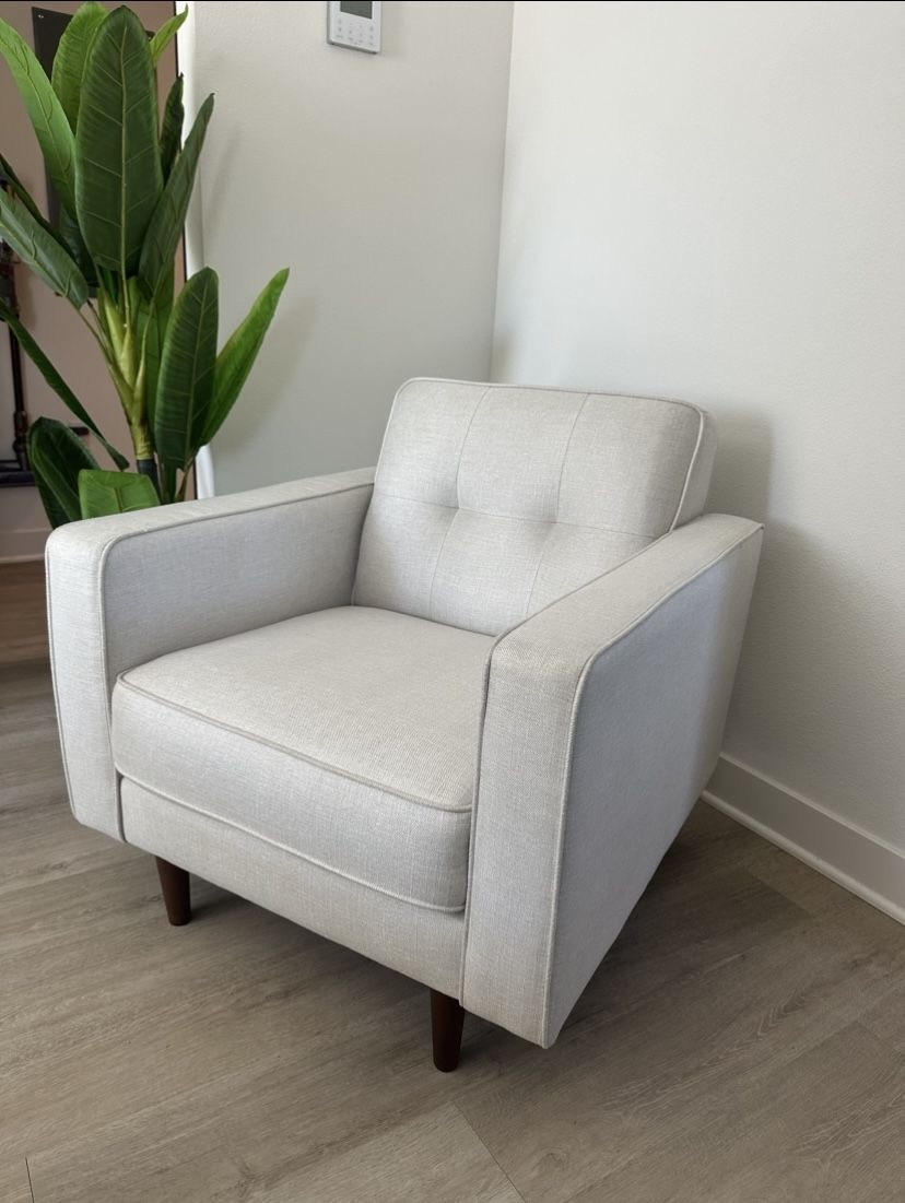 Two Cushioned Accent Chairs