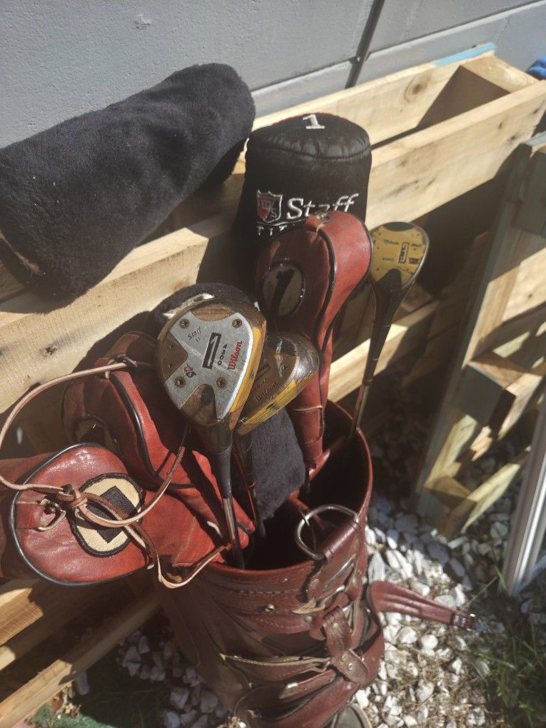 VINTAGE RED LEATHER GOLF BAG & FULL SET OF WILSON STAFF WOODS