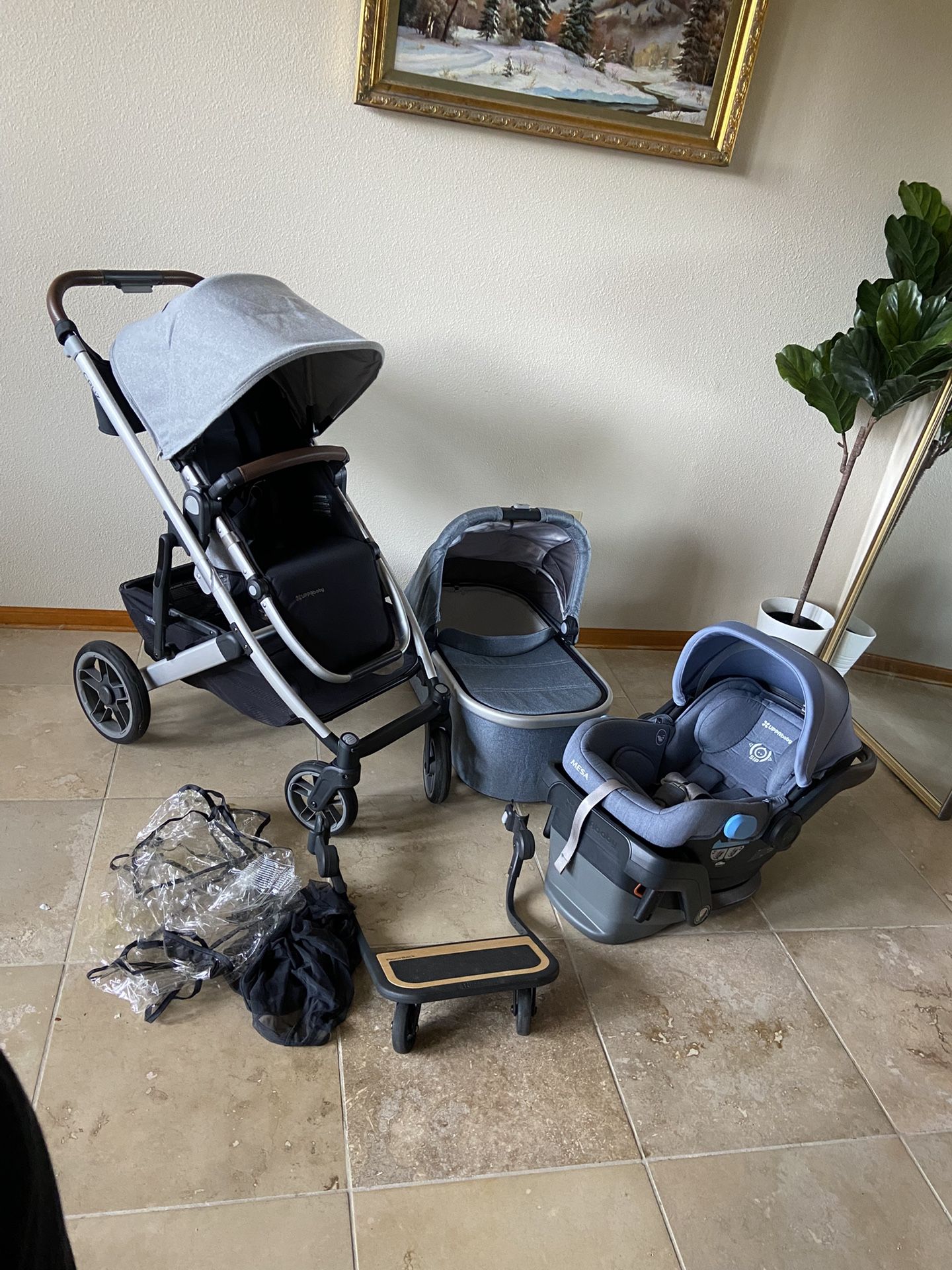 Uppababy Cruz V2 Stroller With Car Seat And Bassinet And Piggyback Board