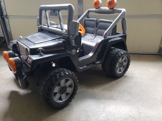 Fisher-Price toddler riding Jeep