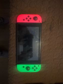 Nintendo Switch with Neon Red and Green Joy-Cons