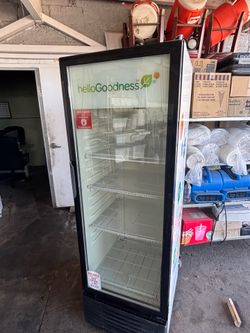 I have this glass-door refrigerator; it works very well, and its temperature drops down to 37 degrees. It is very clean—both inside and out—and ready 