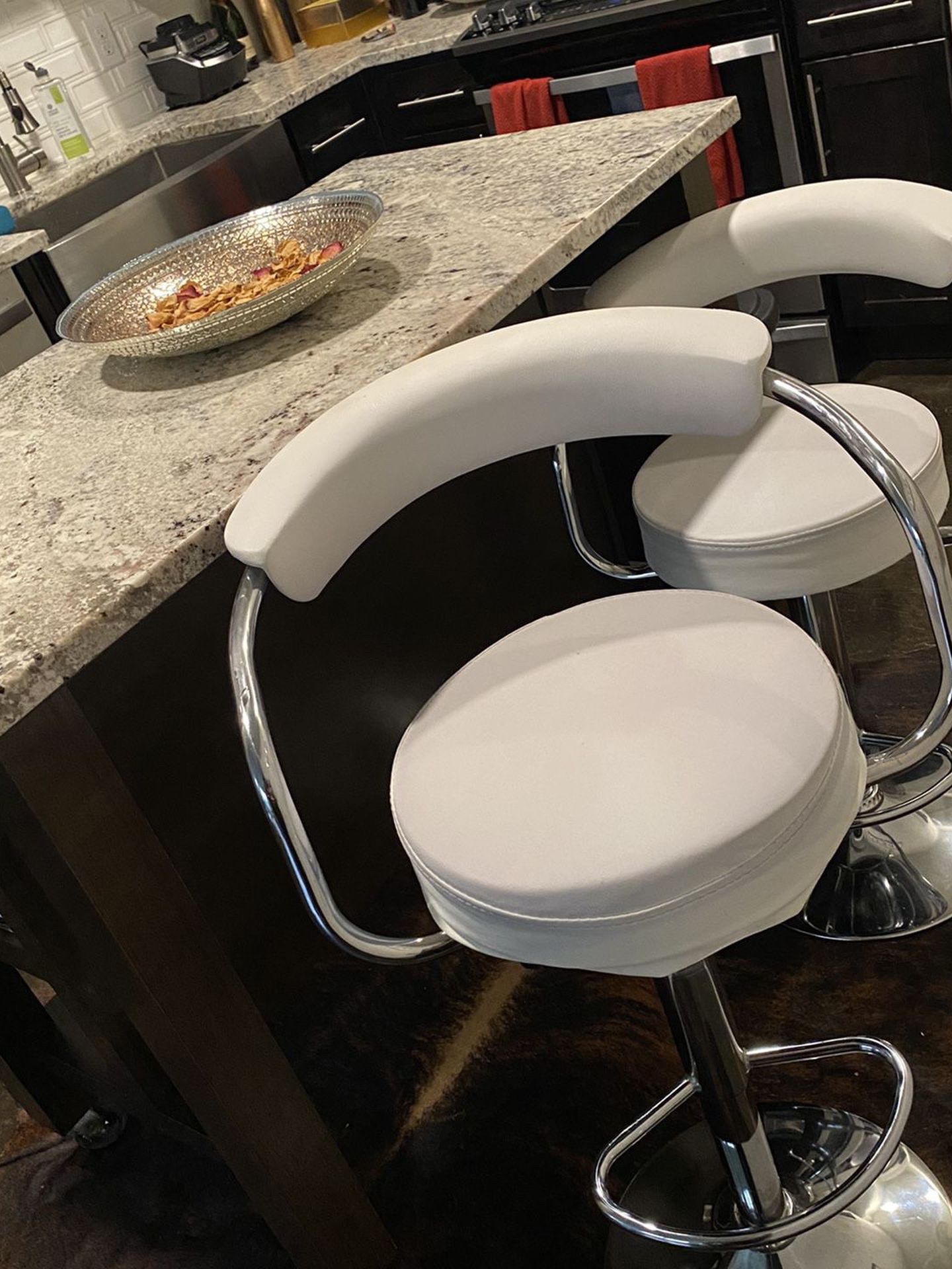 White leather swivel bar stools/chairs