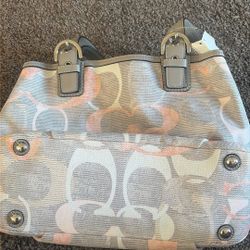 Pink And gray coach purse