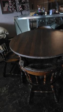 wood table with four chairs