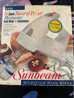 Sunbeam hand mixer.    New in box