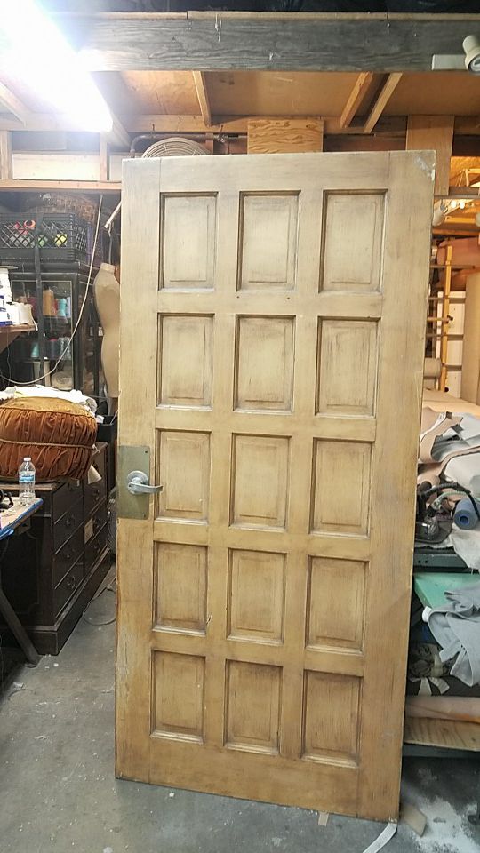 Solid door with panels