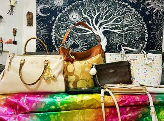Coach and Michael Kors and other name bags