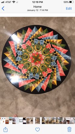 Peruvian 31”round x19”tall Swivel waterproof coffee table....