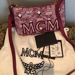 Auth Mcm Sign Red crossbody  https://offerup.com/redirect/?o=QmFnLk5ldw==