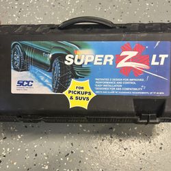 Snow Tire Cables. Never Opened.