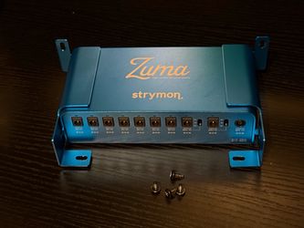 Power supply for pedalboard