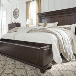 Brynhurst Dark Brown King Panel Storage Bed

