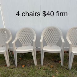 4  Tan Hard Plastic Chairs 