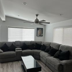 Grey Couch with foldable bed 