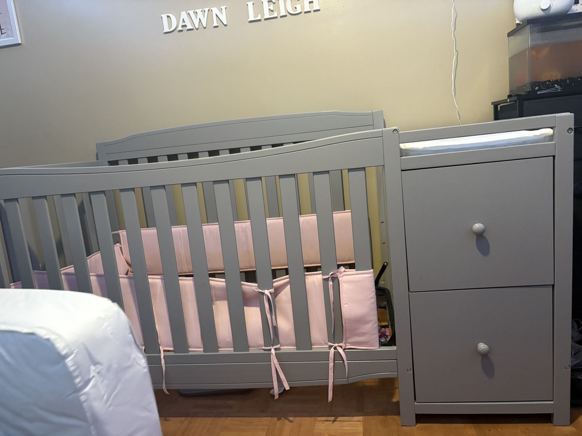 crib with changing table.