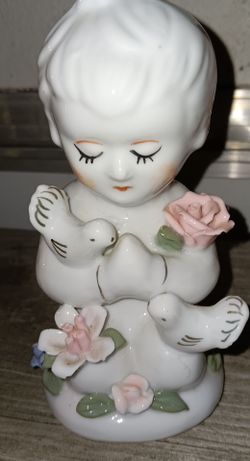 Vintage Porcelain Child Figurine with Doves and Flowers