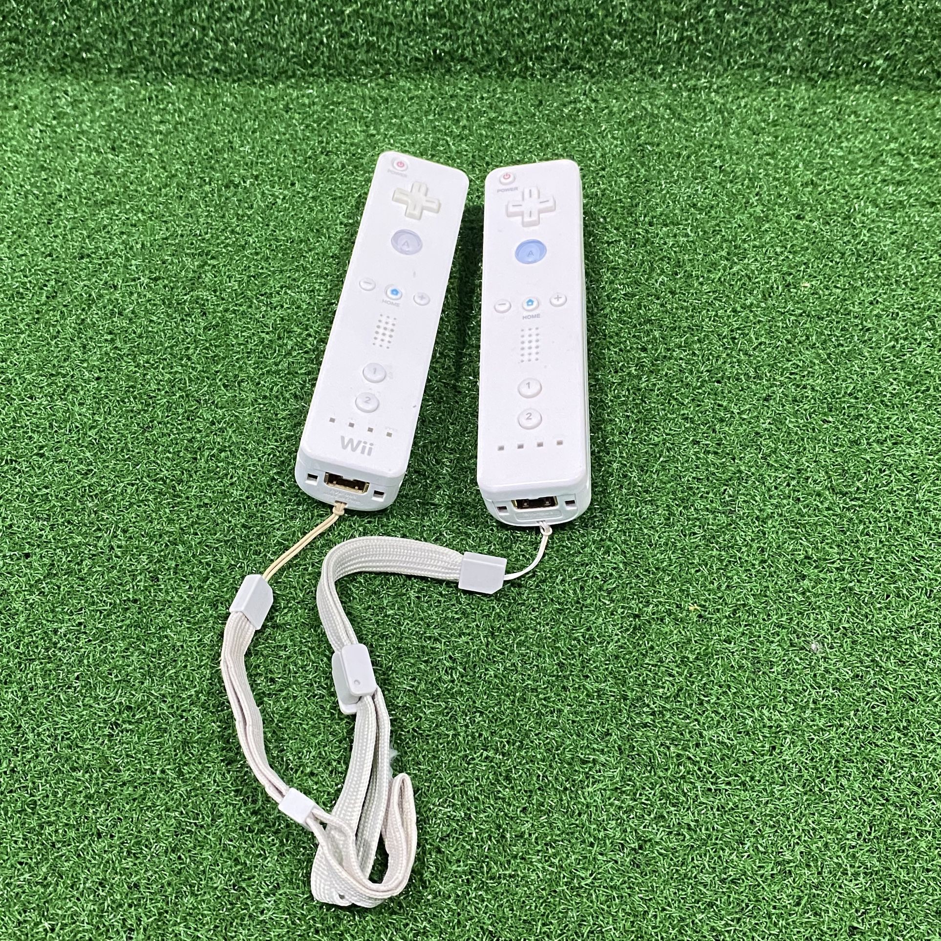2 Nintendo Wii Remotes