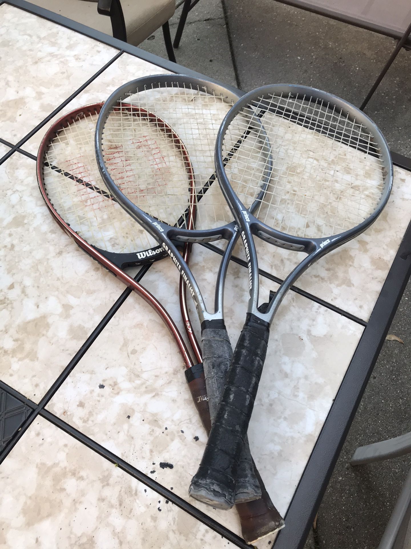 3 tennis rackets