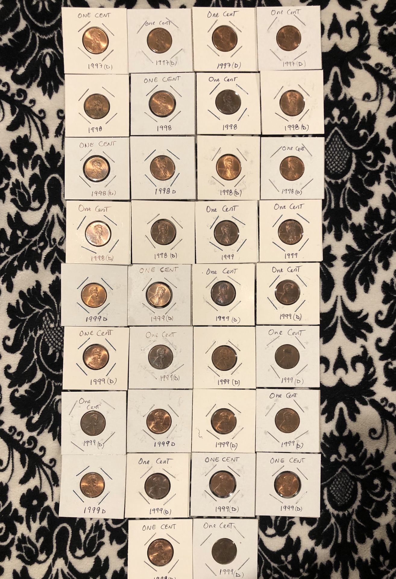 Lot 34 coins; One Cent 1997D(4),1998(3),1998D(7),1999(2),1999D(18)