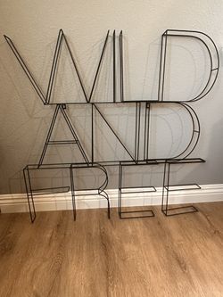 Metal Wild And Free Sign