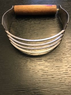 Wooden handled cooking tool
