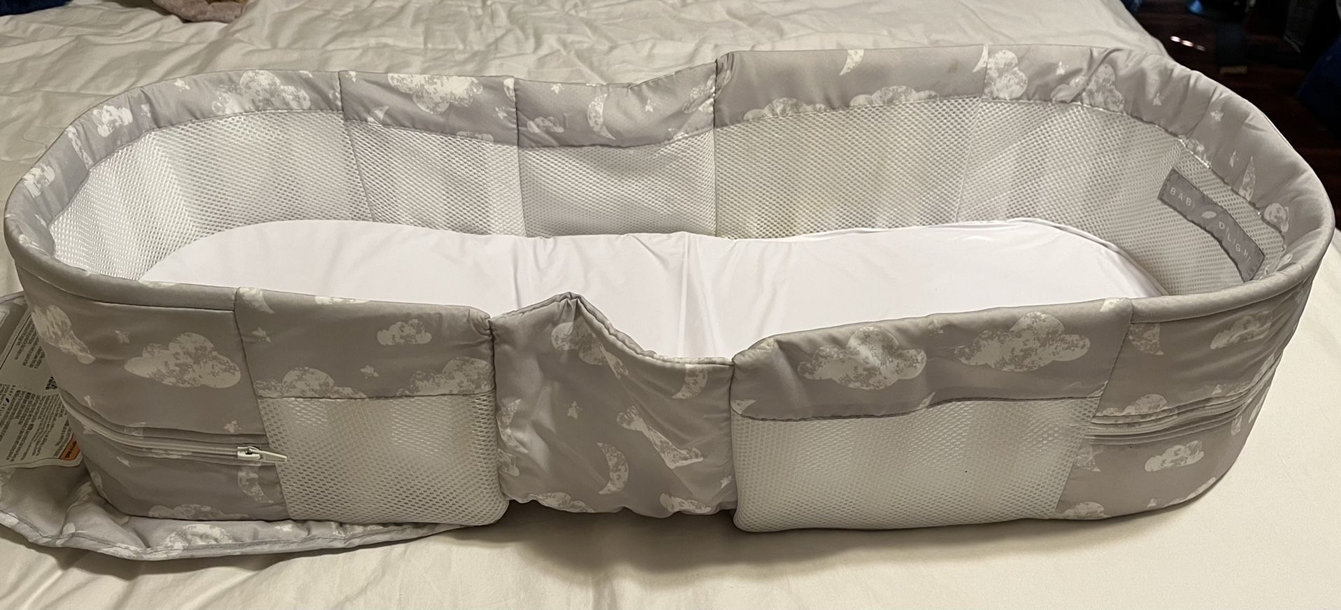 Baby Delight Snuggle Nest portable bassinet . Genly Used $30.00 Or OBO