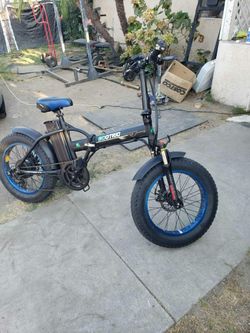 Blue & Black Electric bike ebike E-bike 35mph 40 miles Range. Willing to Trade for PS5 Pro Or Switch 2. Come with keys & charger. All work 100% is fol