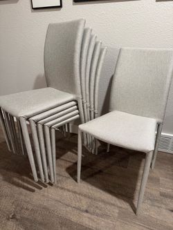 6 modern upholstered stackable dining chairs from Moe’s Furniture