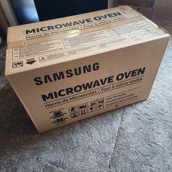 Brand new Samsung 1.9 Cu.ft. Over The Range Microwave Oven