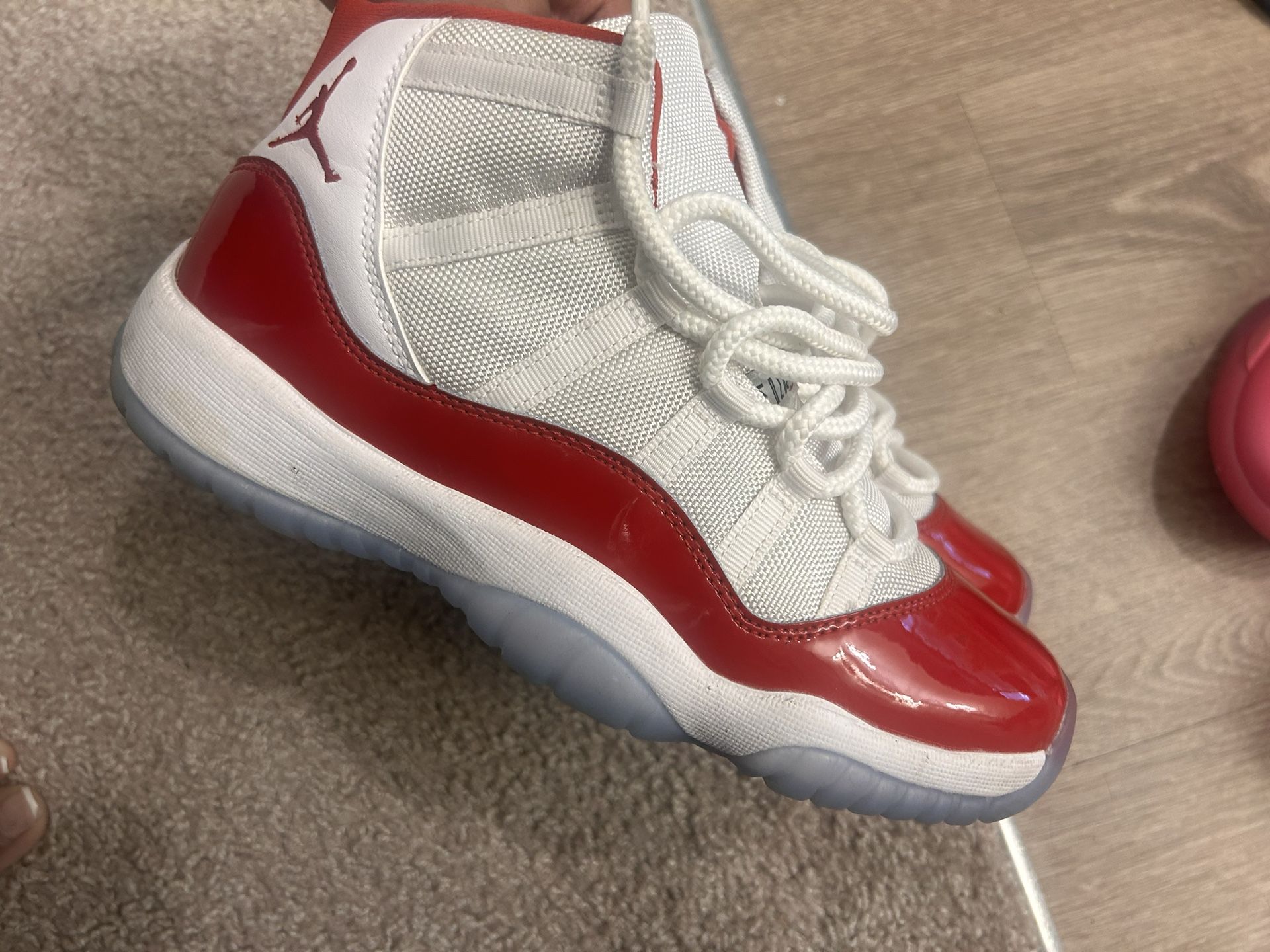 Cherry Red Jordan 11 High Retro