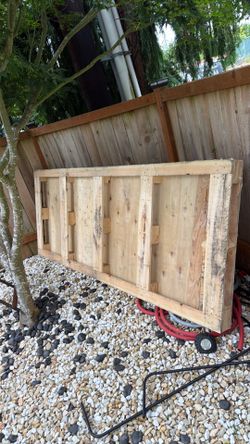 Three wood pallets 2 medium one large