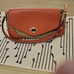 Multi Orange and Fabric Coach Handbag $40