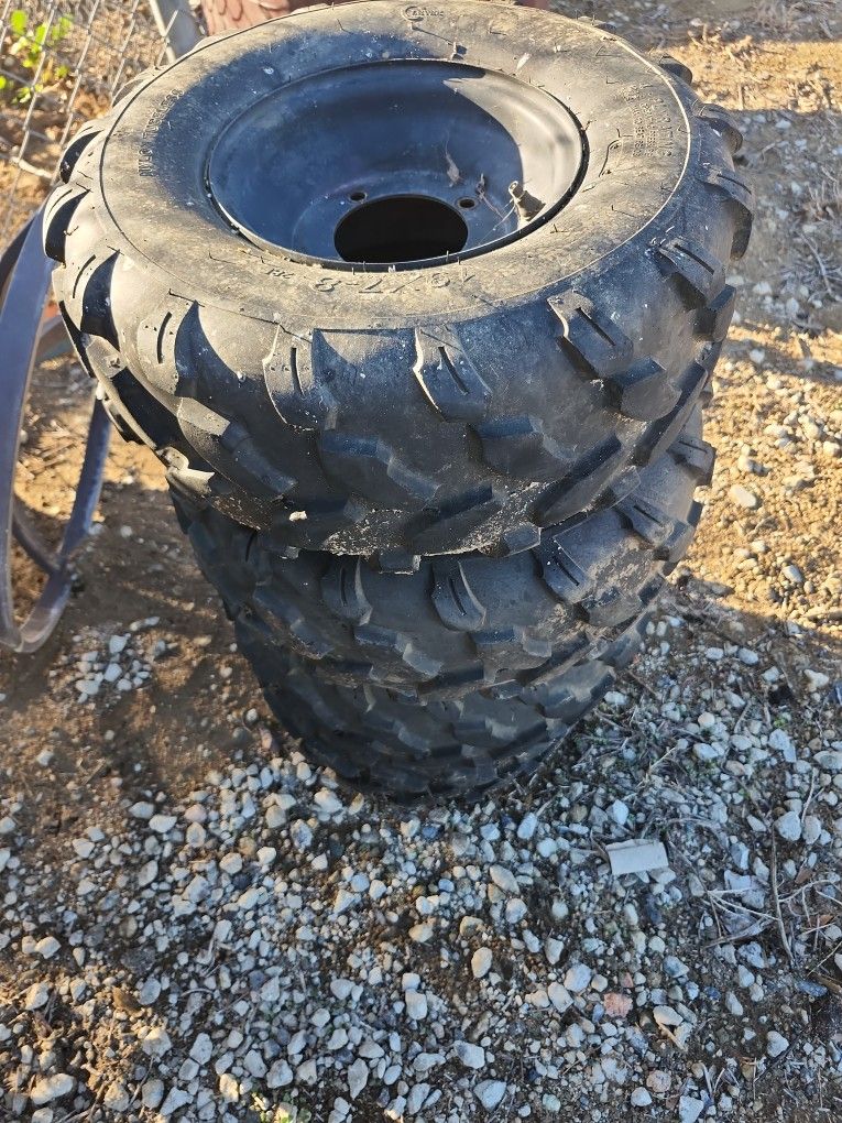19x7-8 QUAD RIMS,&TIRES 