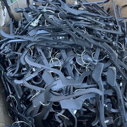 PLASTIC HANGERS. Thousands Of Them.