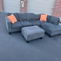 awsome gray sectional with storage ottoman 