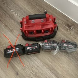 Milwaukee  6 Pack Charger And Batteries