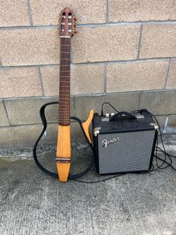 Fender amplifier and yamaha electric guitar