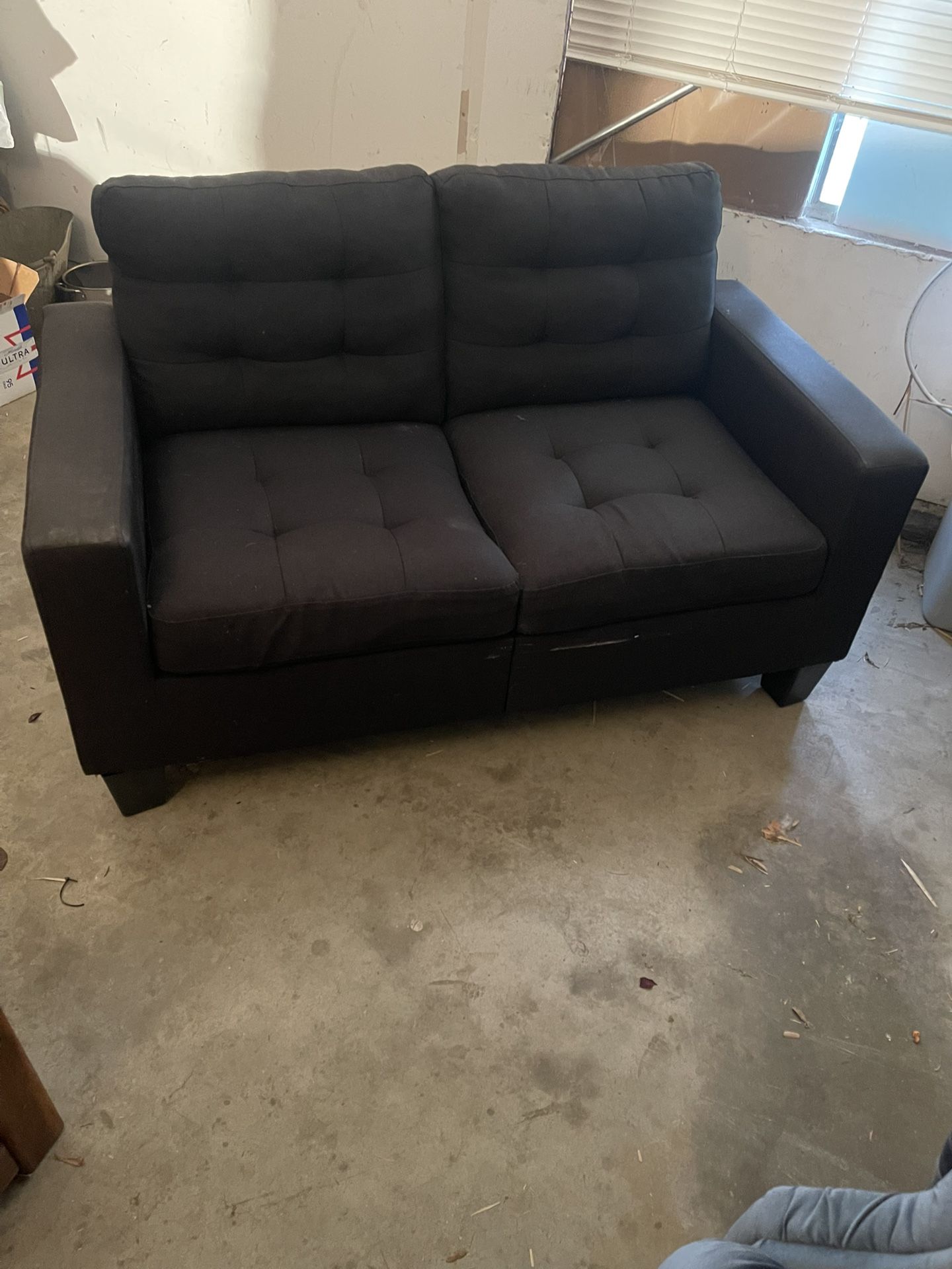 Black two person loveseat 