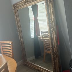 Two. Matching mirrors, one great big one and one little one.