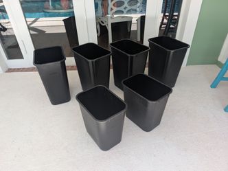Four  Rubbermaid 41 trash cans and two 28 quarts