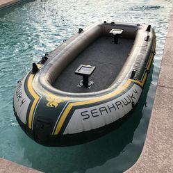 Brand new seahawk 4 boat with brand new motor, floor, seats, oar, etc. $300 for all. Higley and ray.