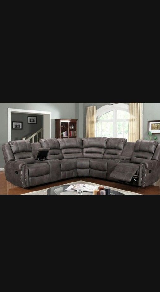 Kenedy Brown reclining Sectional Sofa