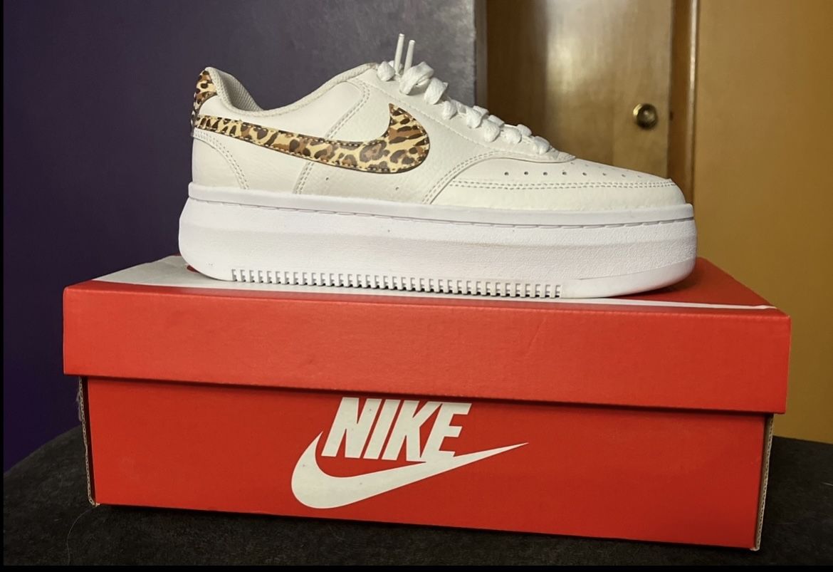 Nike White Sneakers with Leopard Print Swoosh
