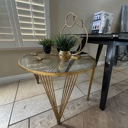 Glass top/gold trim table