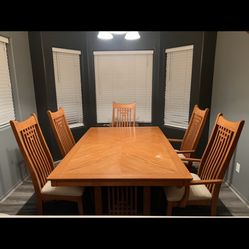 Dining table and chairs with China cabinet
