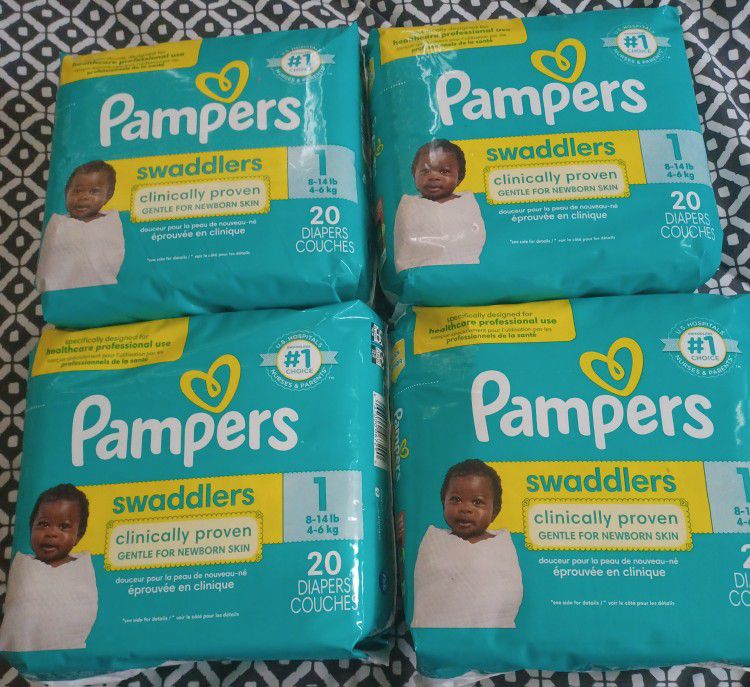 4 Packs of 20 Count,  Pampers Diapers.  New.  $6 each or all 4 bags for $20 