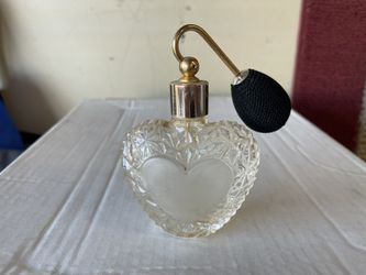 vintage-style heart-shaped glass perfume atomizer bottle. 